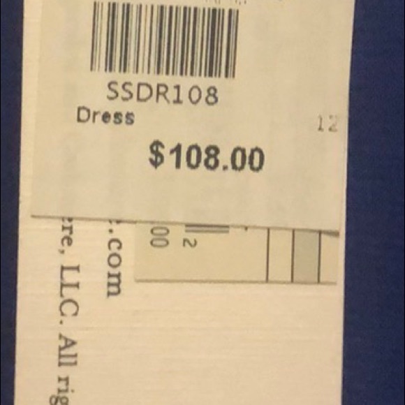 Brand new dress still has tags on it. - Picture 3 of 3